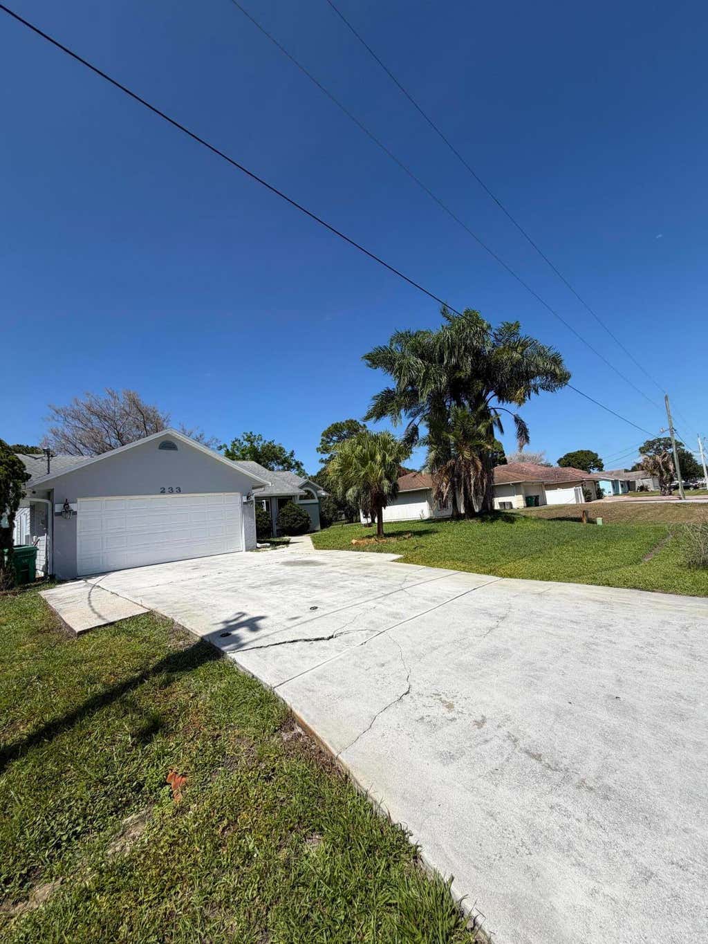 Photo of 233 SW Chapman Avenue, Port Saint Lucie, FL 34984 (MLS # B26033467)