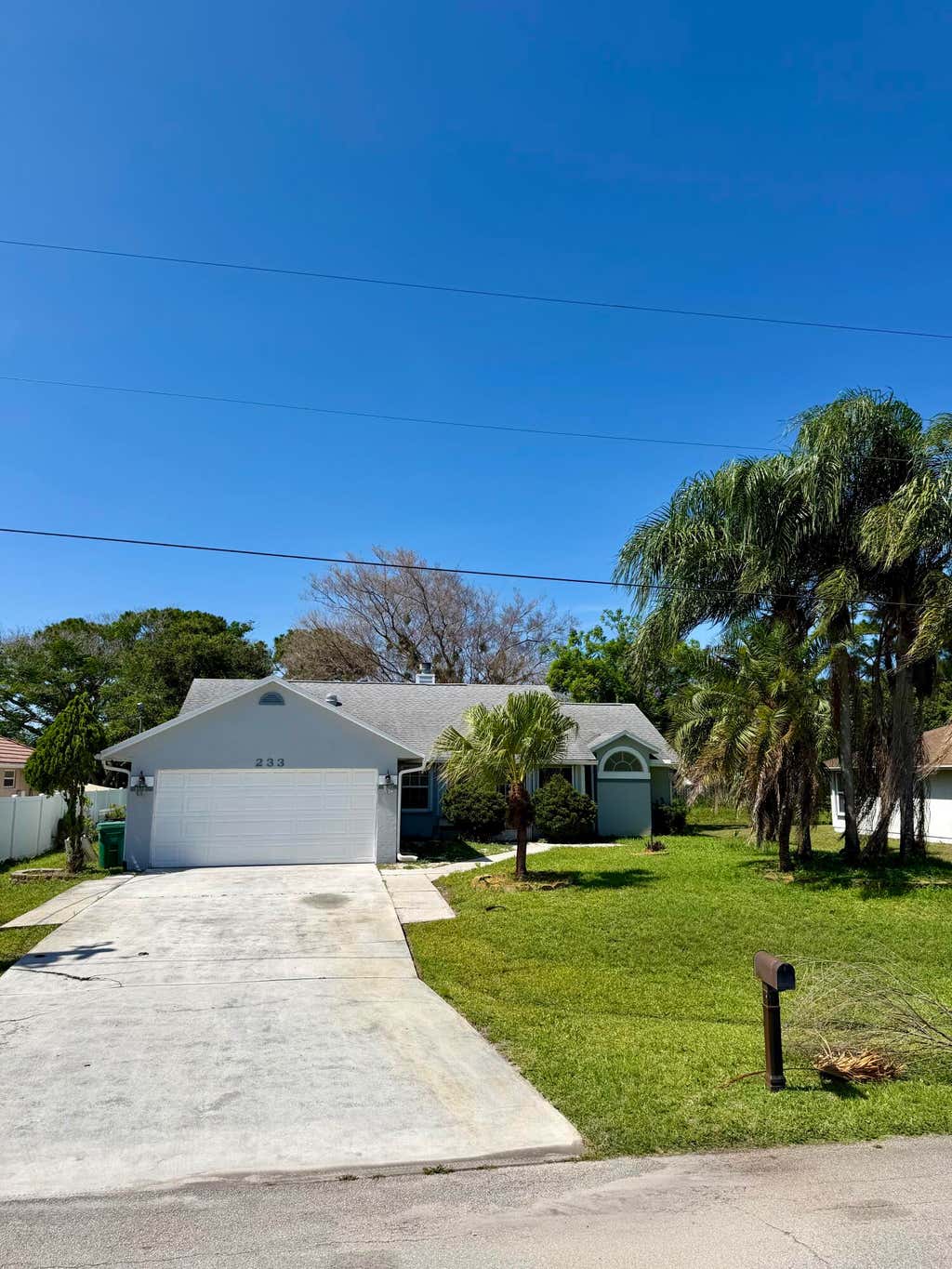 Photo of 233 SW Chapman Avenue, Port Saint Lucie, FL 34984 (MLS # B26033467)