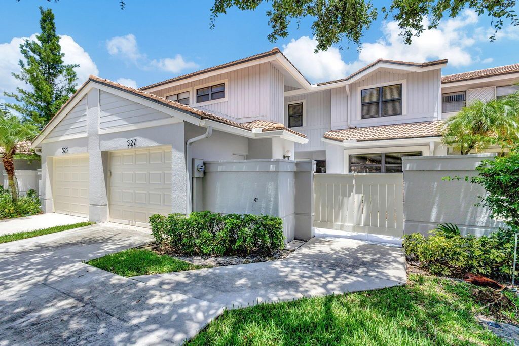 Photo of 527 Prestwick Circle, Palm Beach Gardens, FL 33418 (MLS # R11012466)