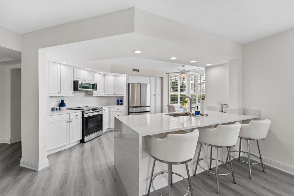 Photo of 511 Bay Colony Drive N, Juno Beach, FL 33408 (MLS # R10924711)