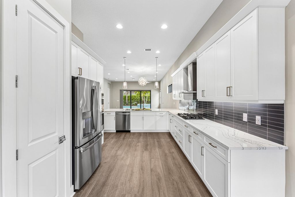 Photo of 13129 Faberge Place, Palm Beach Gardens, FL 33418 (MLS # B26017077)