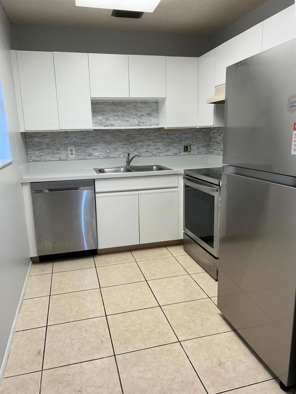 Photo of 19 Lake Vista Trail #203, Port Saint Lucie, FL 34952 (MLS # R11122972)