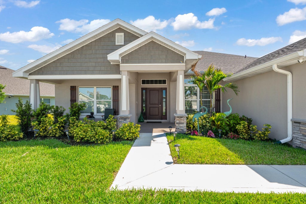 Photo of 8659 Waterstone Boulevard, Fort Pierce, FL 34951 (MLS # B26042219)