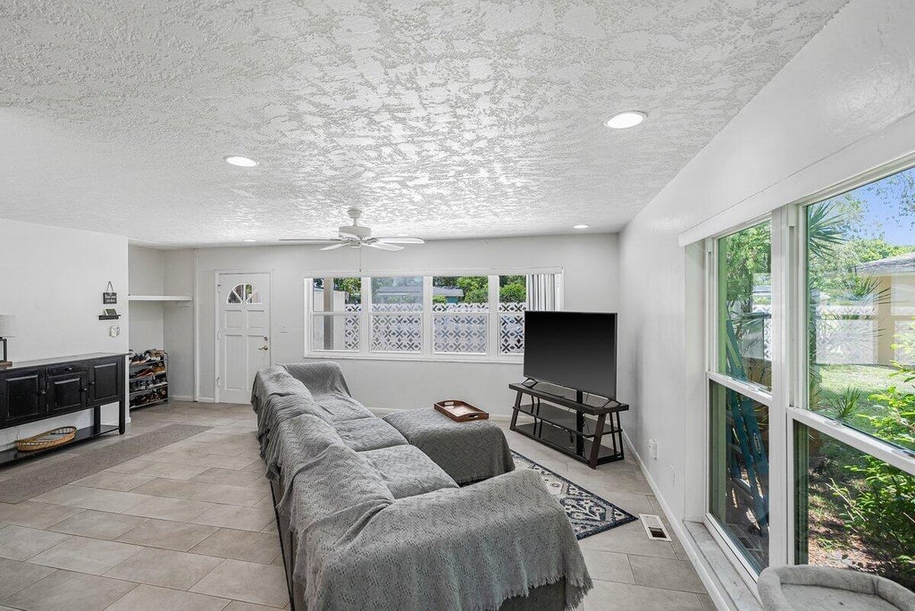 Photo of 426 SE Tranquilla Avenue, Port Saint Lucie, FL 34983 (MLS # R11063521)