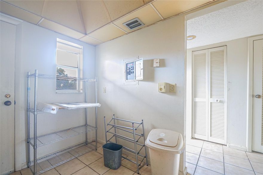There is a price change on this unit because both baths are being renovated, freshly repaired kitchen and had a nice paint job throughout.Te unit itself is located in a very attractive, gated community with park like setting.  This unit must be occupied by the new owner,;not for rental at this time. Public transportation stops at the community entrance and it serves multiple shopping centers.  View on a pool (community has 3)675 or better credit score and 55 K income required. Owner will offer financing with 20% down at 10% interest only to get the sale done.  New owner can refinance or get HELOC and pay off without penalty at any time.  The owner financing will save the buyer thousands in bank fees that can be put to the down payment or renovation. Owner will pay off assessments ($5K) at closing