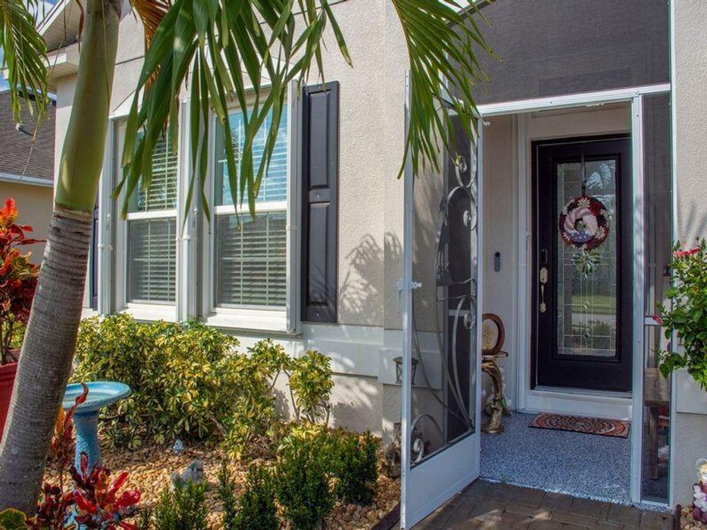 Photo of 602 Gossamer Wing Way, Sebastian, FL 32958 (MLS # R11161636)