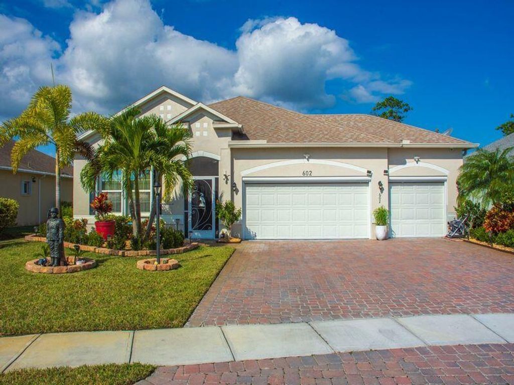 Photo of 602 Gossamer Wing Way, Sebastian, FL 32958 (MLS # R11161636)