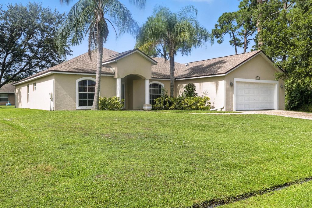 Photo of 1456 SW Patricia Avenue, Port Saint Lucie, FL 34953 (MLS # R11107031)