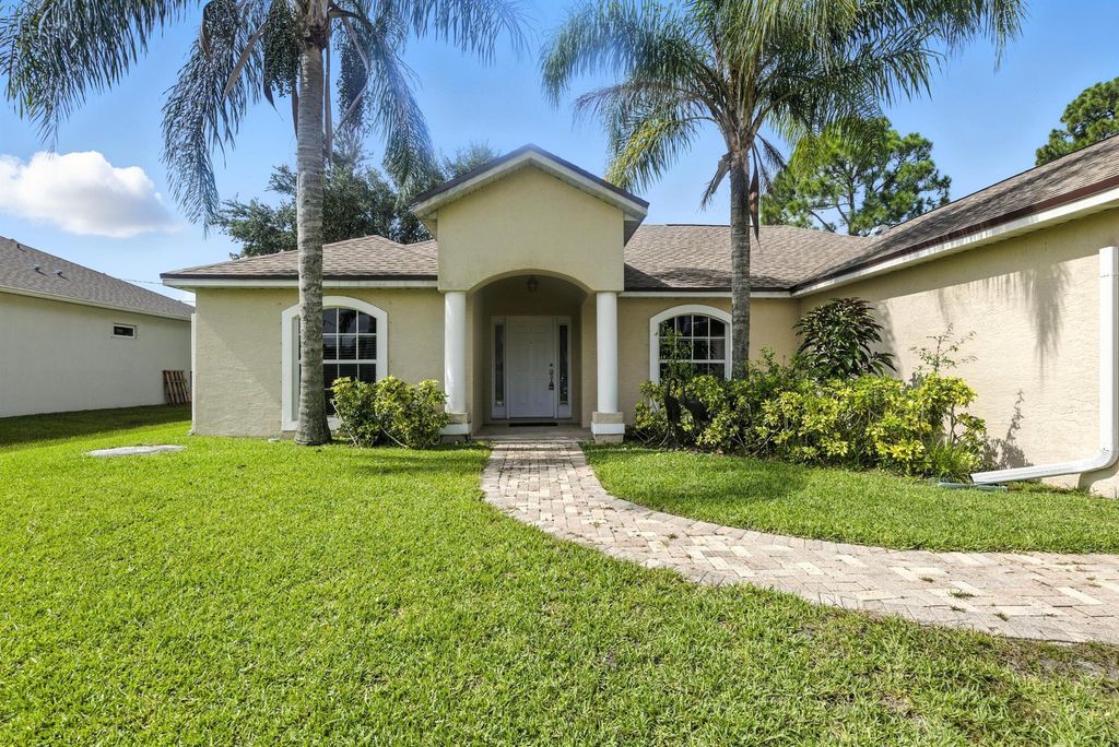 Photo of 1456 SW Patricia Avenue, Port Saint Lucie, FL 34953 (MLS # R11107031)