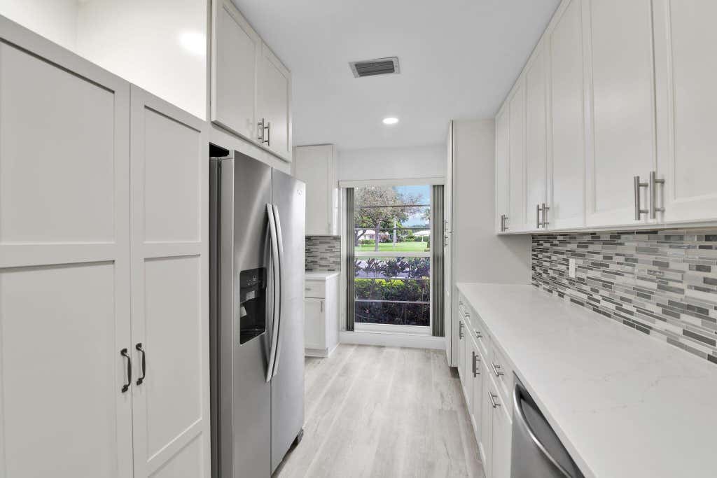 Photo of 8844 Belle Aire Dr #224, Boca Raton, FL 33433 (MLS # R11124306)