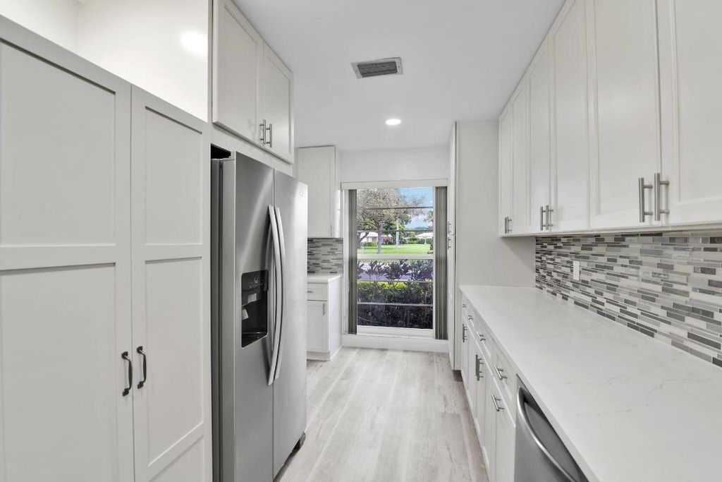 Photo of 8844 Belle Aire Dr #224, Boca Raton, FL 33433 (MLS # R11124306)