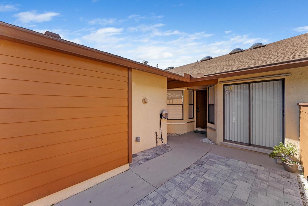 Photo of 3808 Collinwood Lane, West Palm Beach, FL 33406 (MLS # R10936190)