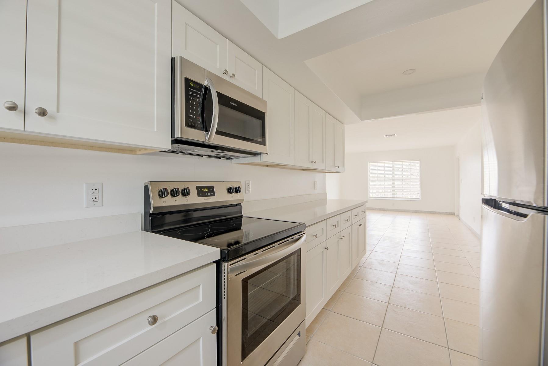 Welcome to 1017 NW 30th Ct, Unit 1 – a bright and spacious 2-bedroom, 2-bathroom ground-floor unit located in the heart of Wilton Manors. This freshly painted home offers +/- 1,000 square feet of comfortable living space, featuring an updated kitchen with modern appliances, in-unit washer and dryer, and central air conditioning. Enjoy the convenience of two off-street parking spaces and a well-maintained, smoke-free building. Just minutes from local shops, dining, and entertainment, this pet-friendly property is perfect for those seeking a central and easy South Florida lifestyle.