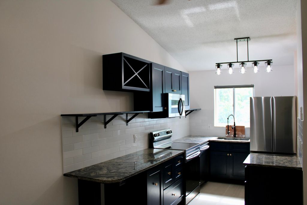 Photo of 5214 Stacy St #4, West Palm Beach, FL 33417 (MLS # R11129768)