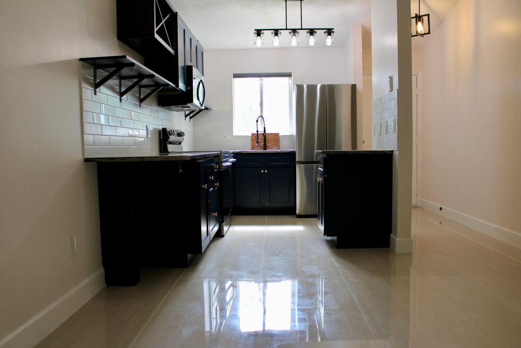 Photo of 5214 Stacy St #4, West Palm Beach, FL 33417 (MLS # R11129768)