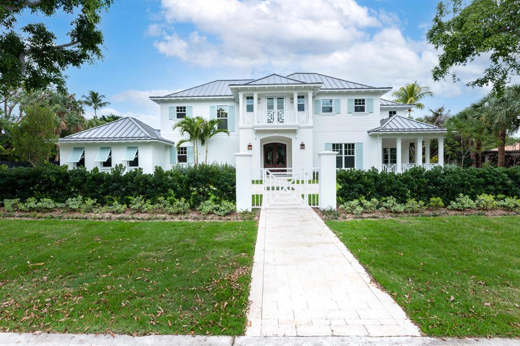 An architectural gem, this British West Indies estate-style home is ideally located on a coveted South of Southern street lined in Banyan trees and ending in a cul-de-sac. Perfect for families and entertaining, this newly constructed home on an oversized lot (28,500 sq. ft.) features a resort sized pool (36''x18'') and an elegant covered loggia. Boasting 7,987 square feet (6,596 sq. ft. under air), this unique home features: 5 bedrooms and six and a half baths; a gourmet chef's kitchen with Wolf appliances, double Sub Zero refrigeration systems, and a butler's pantry; an oversized master suite featuring vaulted ceilings, a fireplace, and an oversized closet with two islands and a vanity; two laundry rooms (upstairs and downstairs)