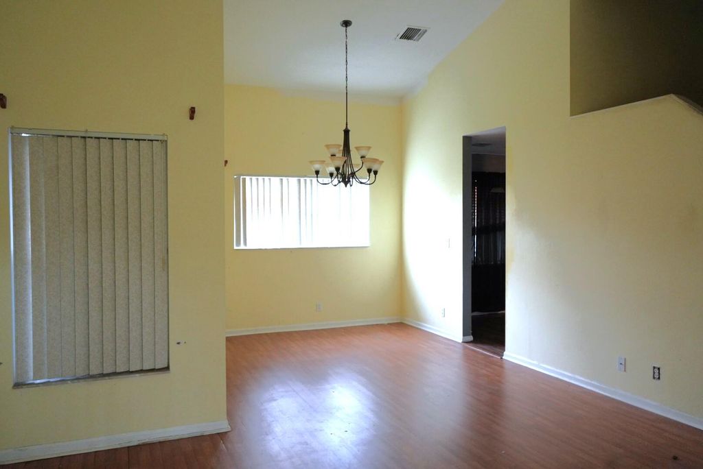 Photo of 133 Heatherwood Drive, Royal Palm Beach, FL 33411 (MLS # R10953912)