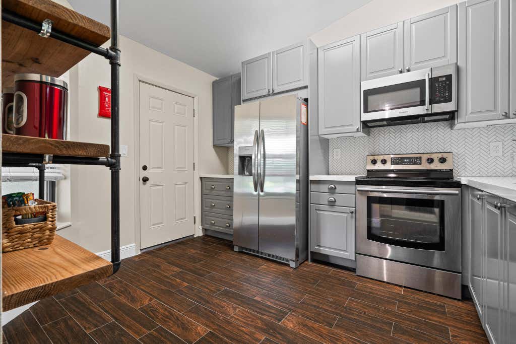 Photo of 7660 NW 96TH Terrace, Tamarac, FL 33321 (MLS # B26064233)