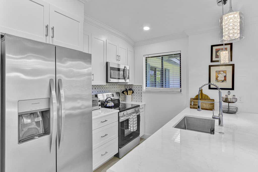 Photo of 106 Club Drive, Palm Beach Gardens, FL 33418 (MLS # B26038994)