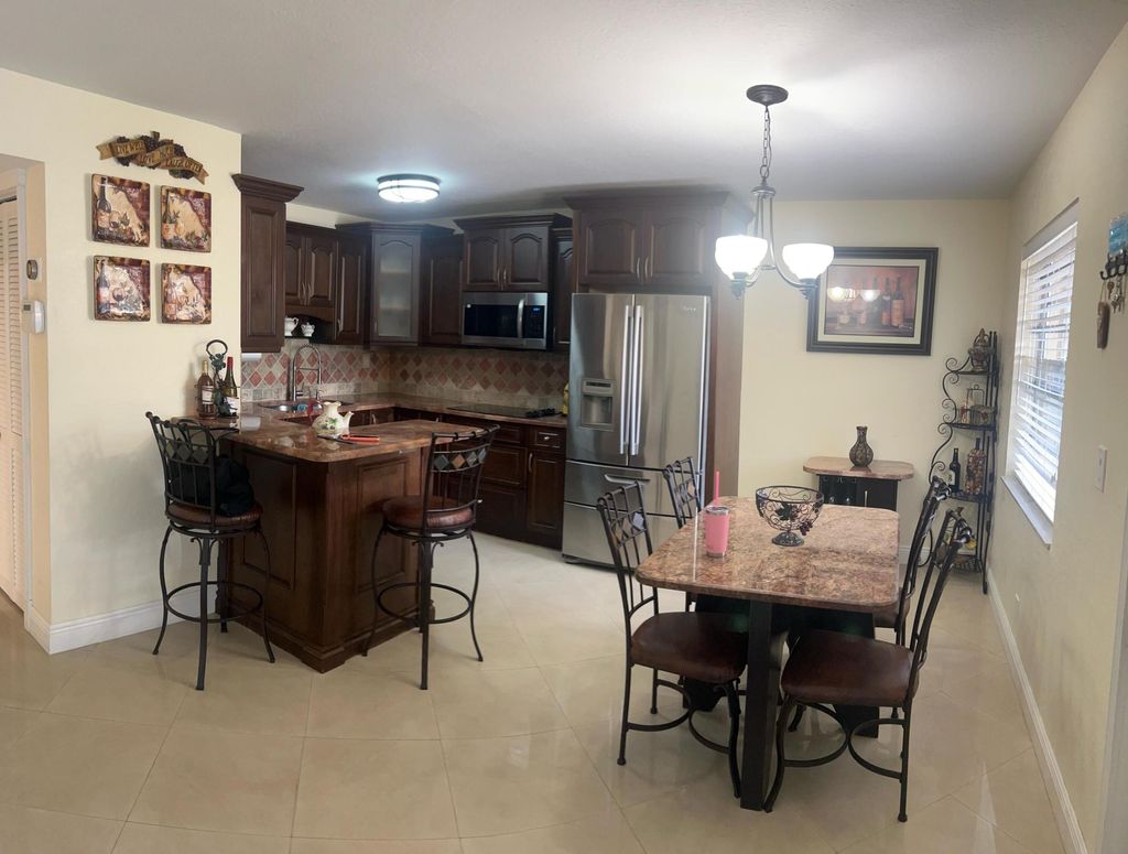 Photo of 1753 3rd Ave N Avenue N #106, Lake Worth Beach, FL 33460 (MLS # R11085917)