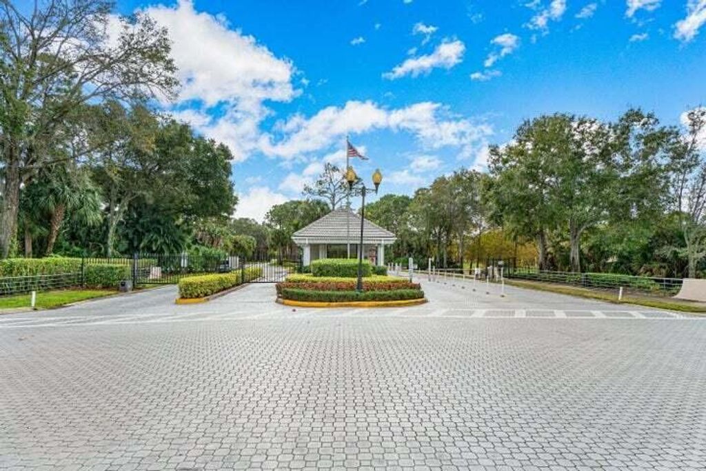 Photo of 100 Caribe Court, Greenacres, FL 33413 (MLS # R10936172)