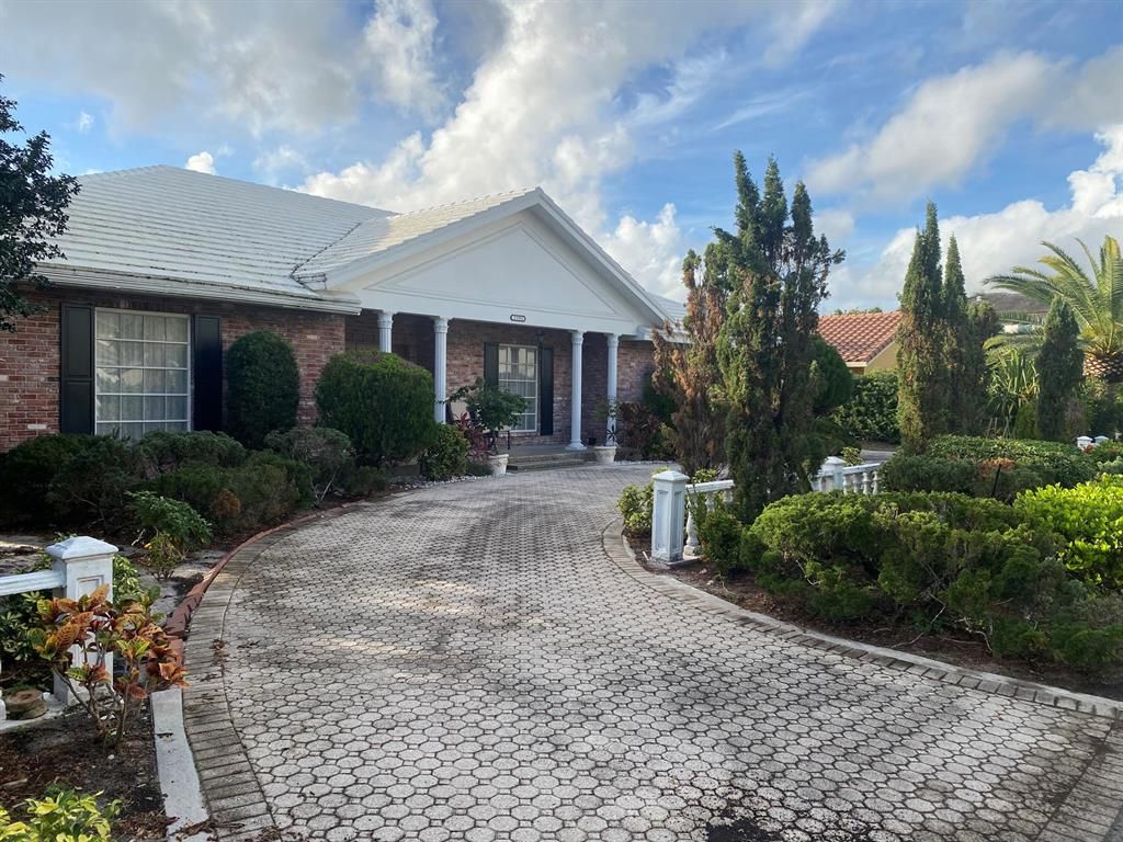 Photo of 2395 Acorn Palm Road, Boca Raton, FL 33432 (MLS # R10765413)