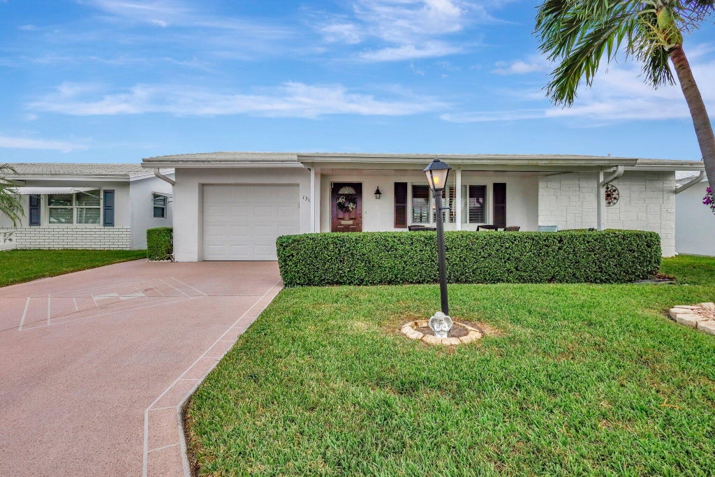 Photo of 1316 SW 18th Court SW, Boynton Beach, FL 33426 (MLS # R11035000)