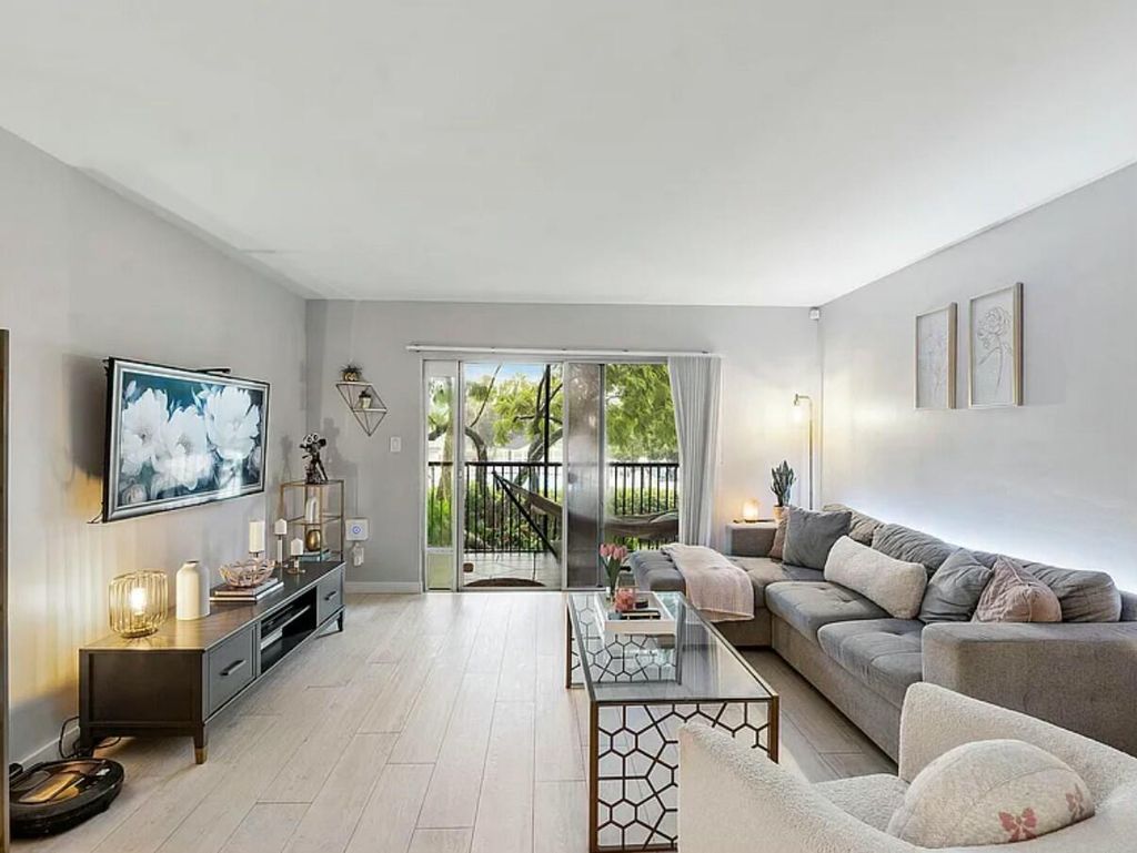 Photo of 2212 S Cypress Bend Drive #205, Pompano Beach, FL 33069 (MLS # R11045801)