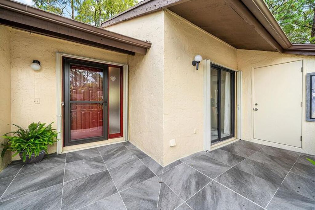 Photo of 33 Copper Pod Court #33, Royal Palm Beach, FL 33411 (MLS # R11126690)