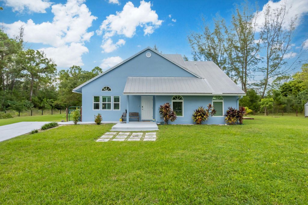 Photo of 15541 80th Lane N, The Acreage, FL 33470 (MLS # R11142047)