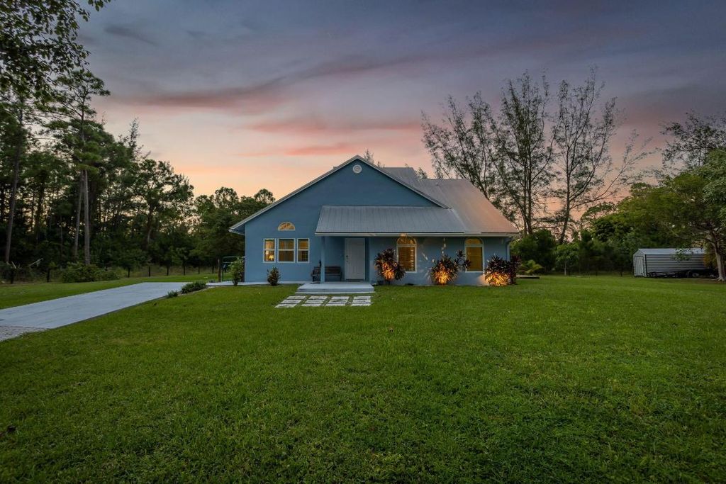Photo of 15541 80th Lane N, The Acreage, FL 33470 (MLS # R11142047)