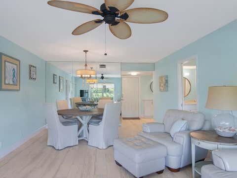 Photo of 5560 Tamberlane Circle #324, Palm Beach Gardens, FL 33418 (MLS # B26059393)
