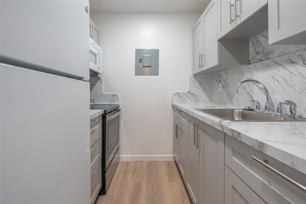 Photo of 2551 NW 39th Terrace #202, Lauderdale Lakes, FL 33311 (MLS # F10423465)