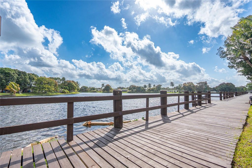 Photo of 2551 NW 39th Terrace #202, Lauderdale Lakes, FL 33311 (MLS # F10423465)