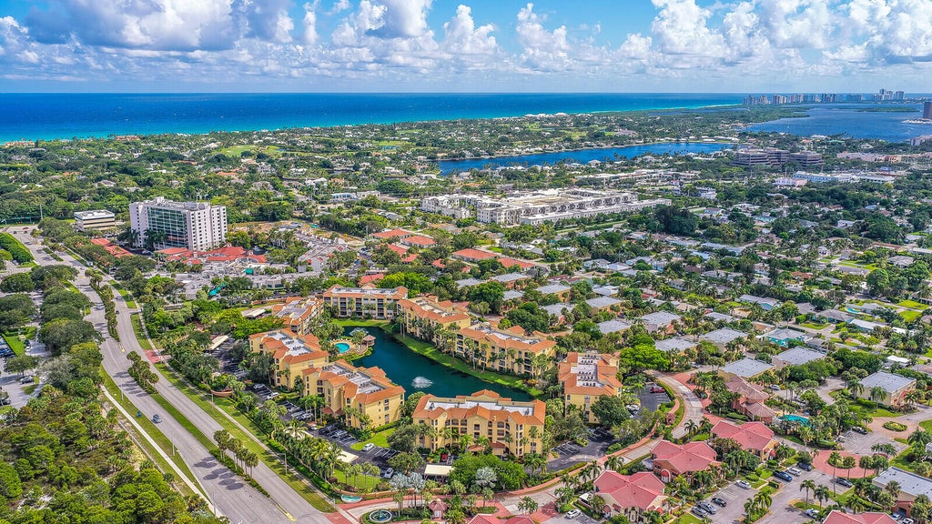 Photo of 400 Uno Lago Drive #103, Juno Beach, FL 33408 (MLS # B26090031)