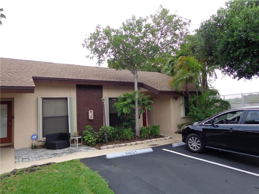 3 Bedroom 2 bathroom end unit Villa! No neighbors to one side! Granite tile countertops and stainless steel appliances. Vaulted ceilings, tile and wood laminate flooring, accordian hurricane shutters, large brick paver patio area perfect for for grilling! Dial 107 at the gate and I will open it for you. Please no showings after 7pm. Thank you