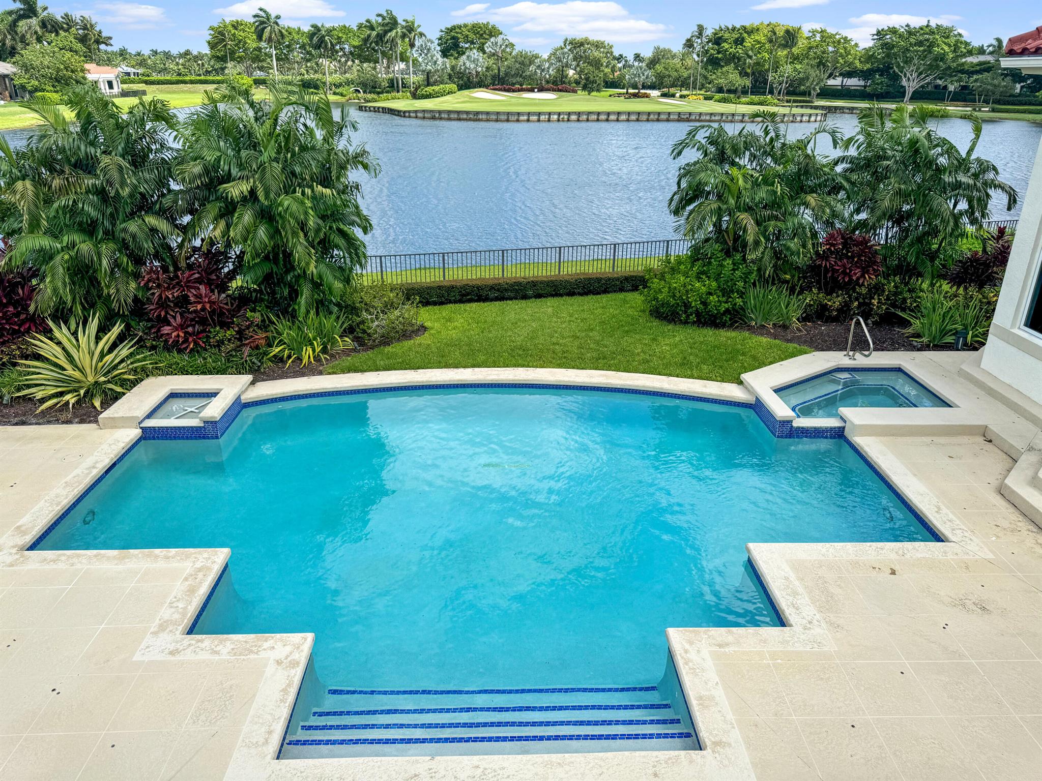 Don't miss one of the rarest and most spectacular pieces of property in all of Woodfield Country Club..... breathtaking golf course and water views! Features include his and her master ensuites, 6 bedrooms,10 bathrooms, his and her offices, a large gym, movie theater, spacious loft, a temperature controlled wine room (accomodating 2000-2500 bottles of wine), first and second floor laundry facilities, full house generator, impact windows, second floor balcony over looking the lake/golf course, a 4 1/2 car garage and so much more. WOW, WOW, WOW! This home has it all!