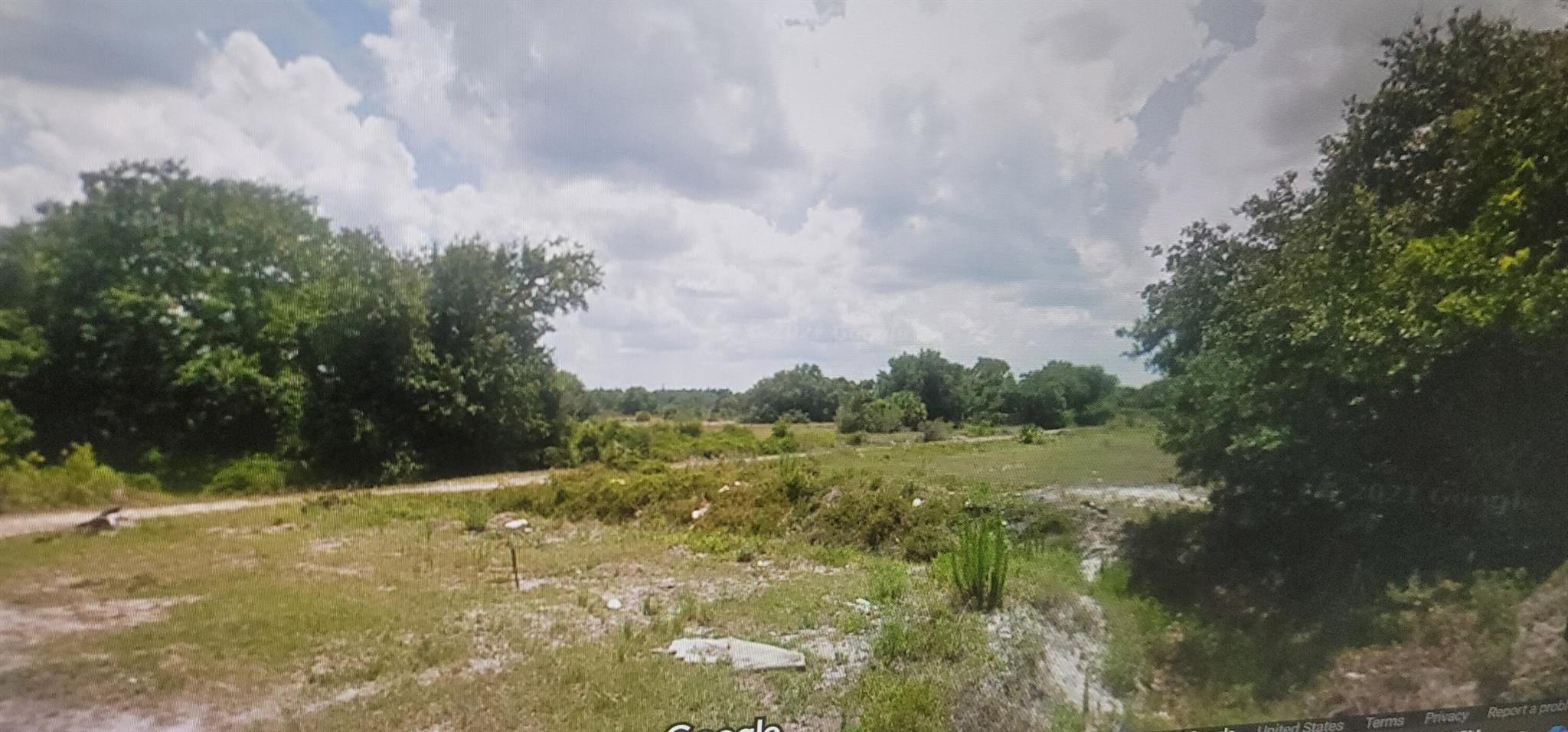 Corner lot clear ready to build .close to main road good fishing .growing area wont last