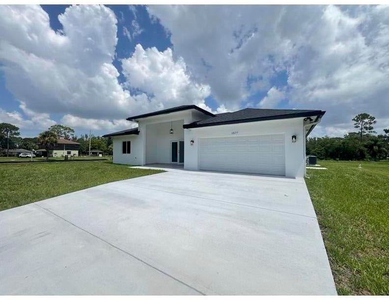 Photo of 13177 47th Court N, The Acreage, FL 33411 (MLS # B26043287)