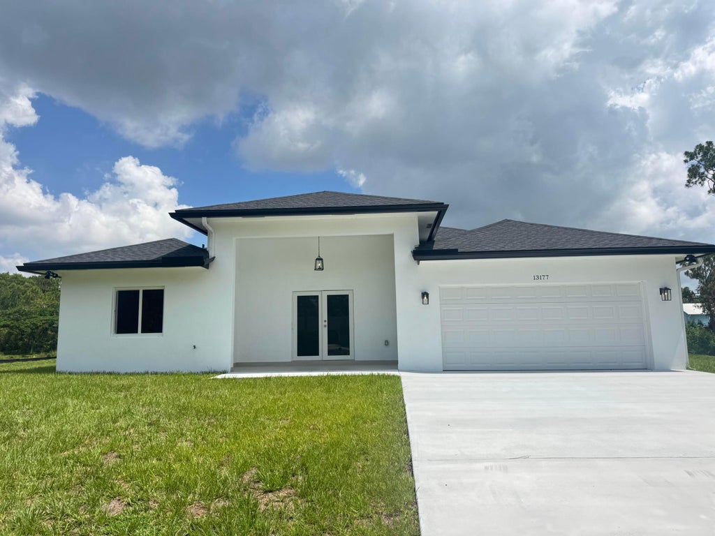 Photo of 13177 47th Court N, The Acreage, FL 33411 (MLS # B26043287)