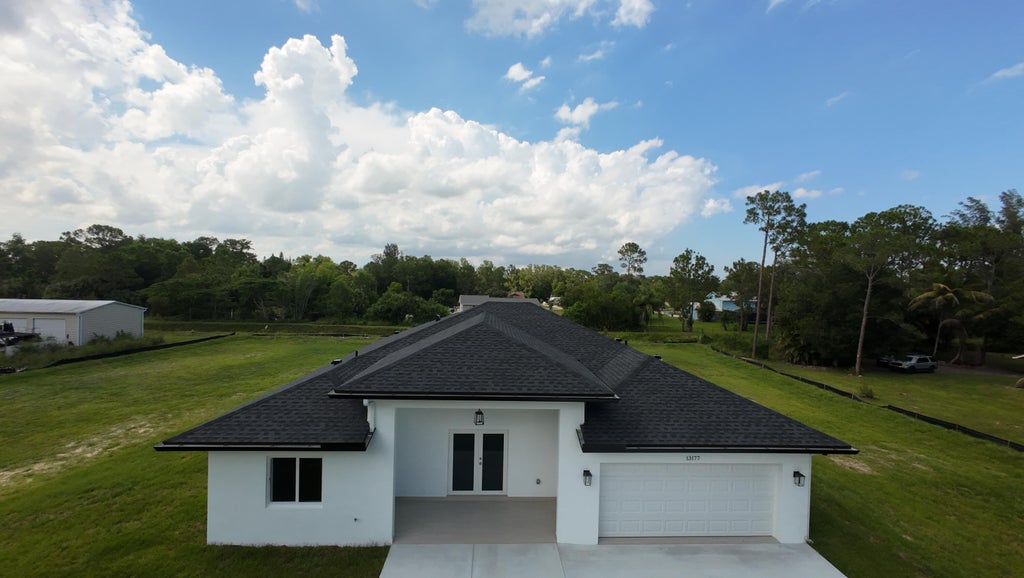 Photo of 13177 47th Court N, The Acreage, FL 33411 (MLS # B26043287)