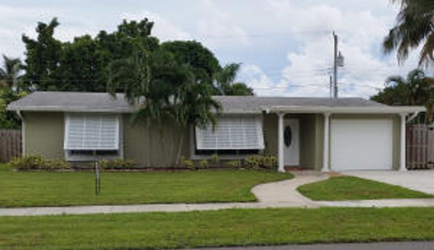 Treasure Island. One of only 2 freshwater islands in PB county. 40 homes most on navigable canals. Sellers relocating for work offers a unique opportunity. Solidly and honestly built in 1960. Smartly expanded, upgraded around 2006. One way in, same way out across small bridge offers a sense of safety. Seems secluded yet within walking/biking distance to all possible amenities, shopping and conveniences. 3 miles to pristine beaches, major hospital. Home kept immaculate, a pleasure to show with notice.