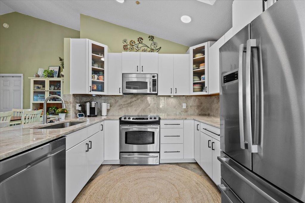 Photo of 11 Dorchester Circle, Palm Beach Gardens, FL 33418 (MLS # R11156374)