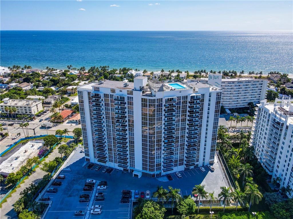 2026 SEASONAL RENTAL. AVAILABLE 4-6 MONTHS. Stunning corner unit with wraparound floor to ceiling windows and doors. Whether you prefer warm ocean breezes from a spacious balcony or enjoying city, ocean, and intracoastal views atop the renovated rooftop pool and deck, this stunning condo will not disappoint. 1 underground deeded parking space and plenty of guest spaces. This freshly renovated 2 bed, 2 bath, largest model-1200 s/f- has everything you need. Tile floors throughout, newer washer/dryer, kitchen and appliances, custom automatic blinds, impact windows & doors, and an abundance of natural light throughout makes this a must rent Florida property. Fabulous location near the gorgeous beaches, shopping, restaurants and more. Make this condo your winter escape!