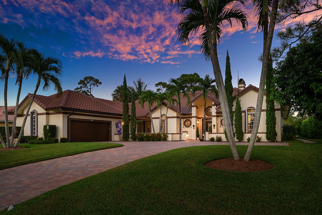 Photo of 586 N Country Club Drive, Atlantis, FL 33462 (MLS # B26065855)