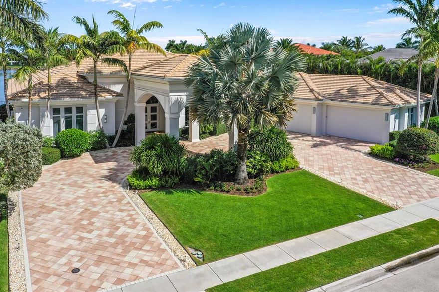 One of a Kind Custom Home.  Contemporary Styling with light and bright colors and decor.  One story overlooking lake and 17th hole at Frenchmans Reeserve.  No expense was spared in finishing and decorating this gem.  4 bedrooms each with ensuite baths.  Separate family, living and dining rooms.  Oversized 1007 sq ft air conditioned garage with room for 4 cars  and golf carts.  Circular driveway and porte-cochere.  Furniture and artwork additional. Must see to appreciate.