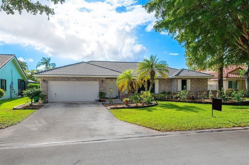 Photo of 5147 NW 59th Way, Coral Springs, FL 33067 (MLS # R10717214)