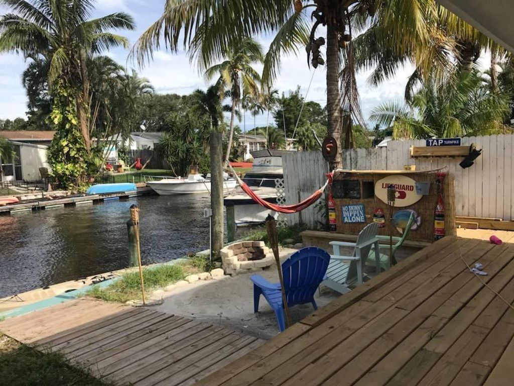 Photo of 129 SW Hideaway Place, Stuart, FL 34994 (MLS # R10757879)