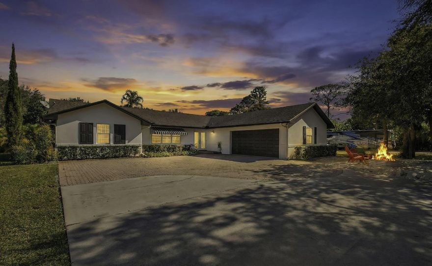 WOW! Remodeled 3/2/2 on 1.5 acres centrally located  in the heart of Palm Beach Gardens in the sought after community of Square Lake. Only 1 mile to I-95 and 3 blocks to shopping. All hurricane impact windows & doors. White shaker kitchen cabinets with stainless steel appliances and granite counters. Very Open floorplan featuring tile floors and a huge 27' x 24' living area. Covered porch overlooking the pool & spa. Parking for numerous vehicles including boats, RV;s etc. Seller collects $885/ month by renting space to RV & boat owners now on a month to month basis. Barn doors separate the living area from bedrooms 2 & 3. In 2021 kitchen appliances were replaced as well as pool heater, reverse osmosis system, new attic insulation, new AC, new well pump and new carbon water filtration