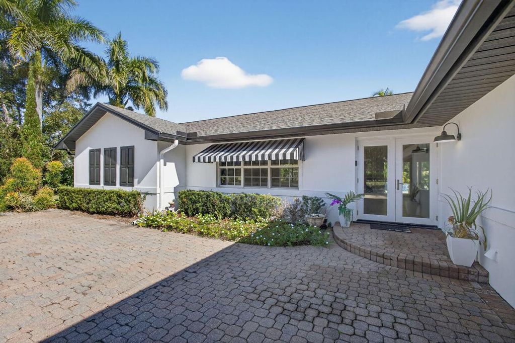 Photo of 8218 S Elizabeth Avenue, Palm Beach Gardens, FL 33418 (MLS # R11152544)